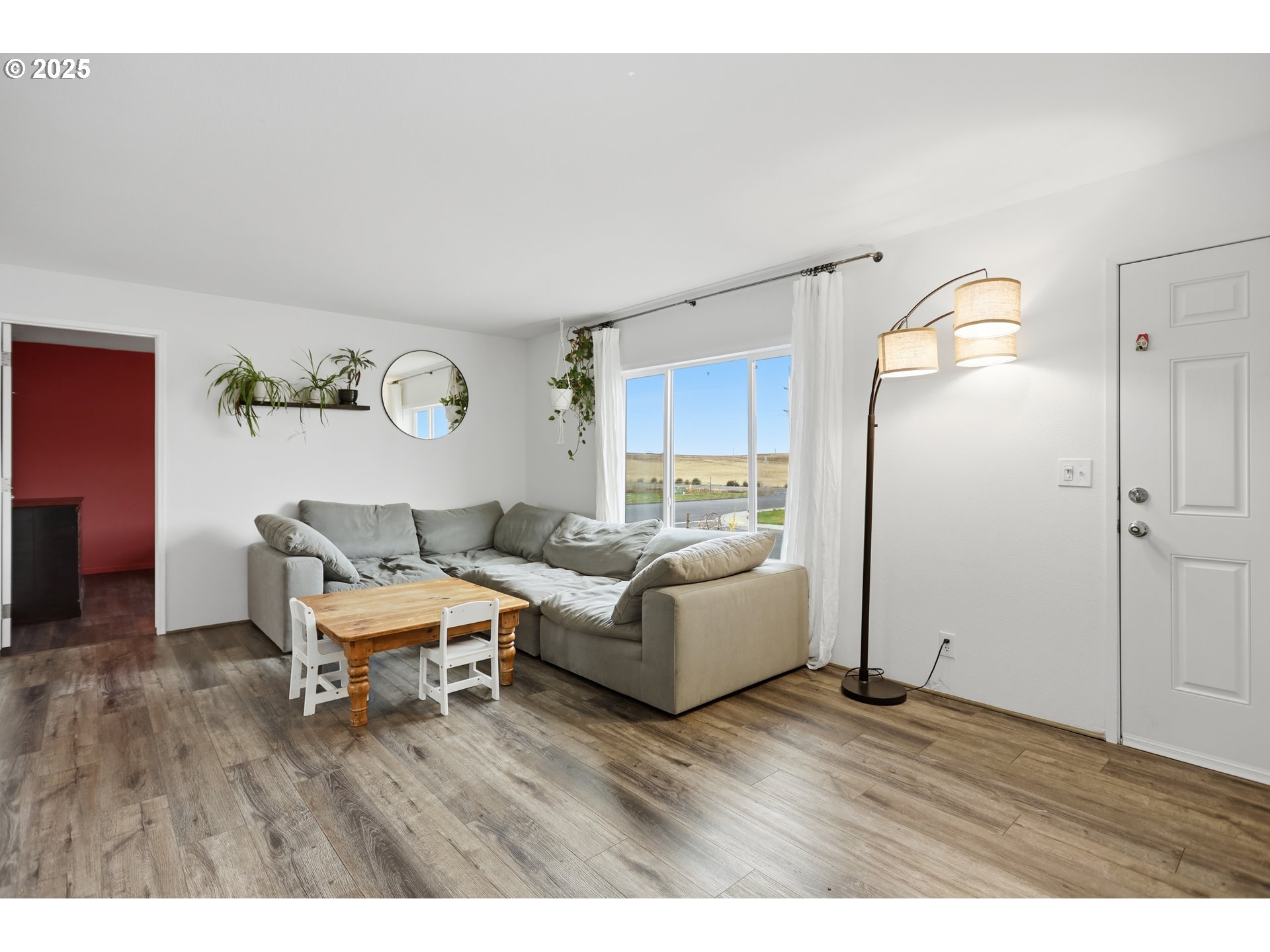 1924 Jaxon Street Goldendale, WA 98620 - Photo 3 of 24 a living room with furniture and wooden floor