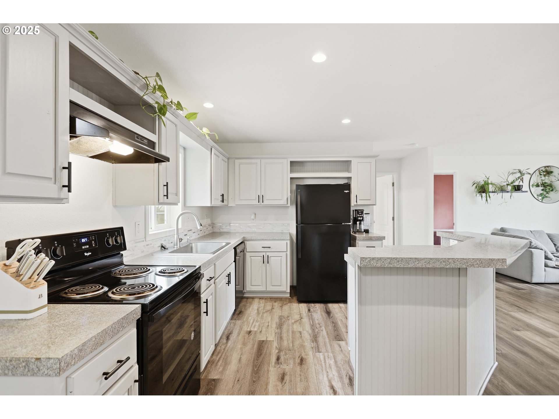 1924 Jaxon Street Goldendale, WA 98620 - Photo 7 of 24 a kitchen with a sink stove and refrigerator