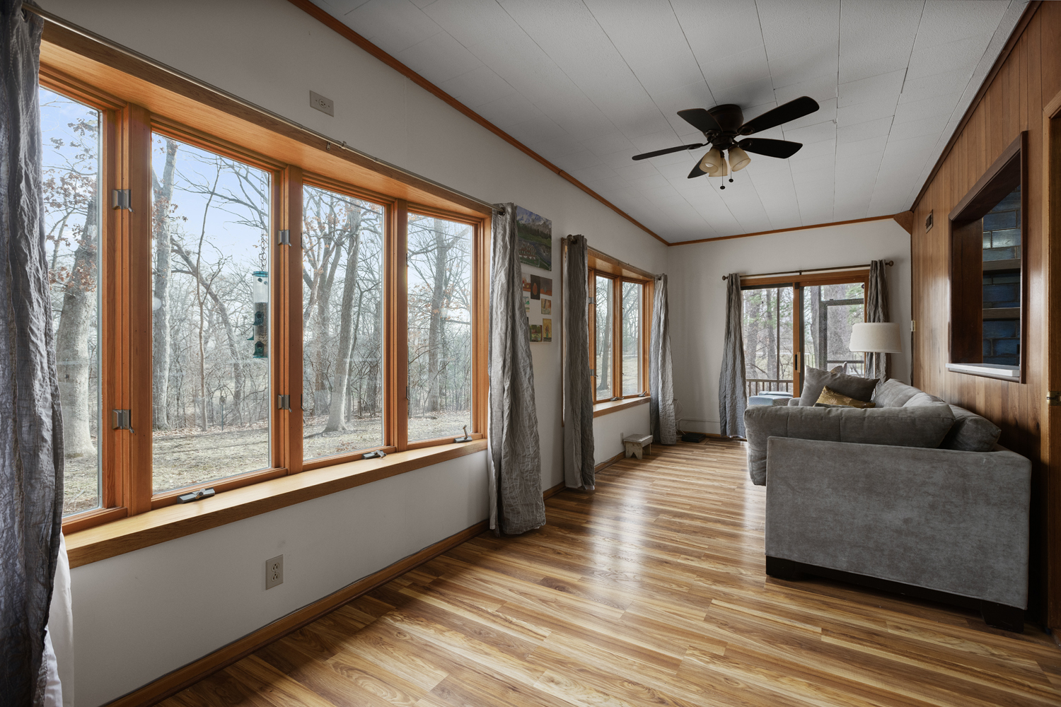 99 Gromer Road Elgin, IL 60120 - Photo 11 of 47 a living room with furniture and a large window