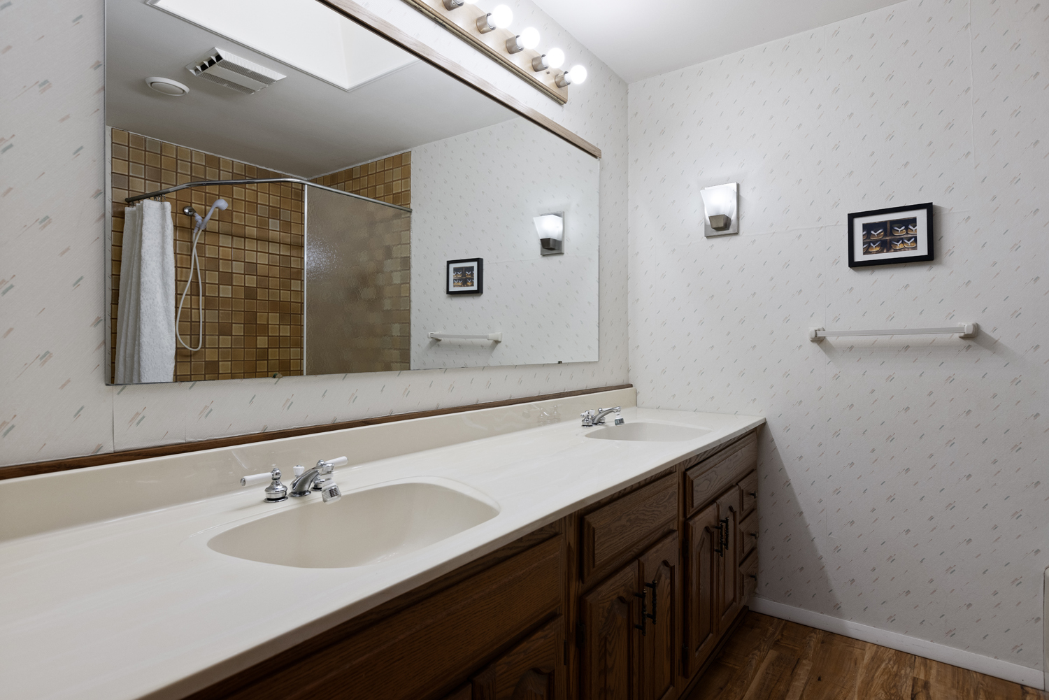 99 Gromer Road Elgin, IL 60120 - Photo 32 of 47 a bathroom with a sink and a mirror