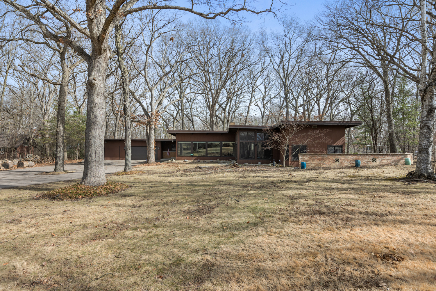 99 Gromer Road Elgin, IL 60120 - Photo 46 of 47 a front view of a house with a garden