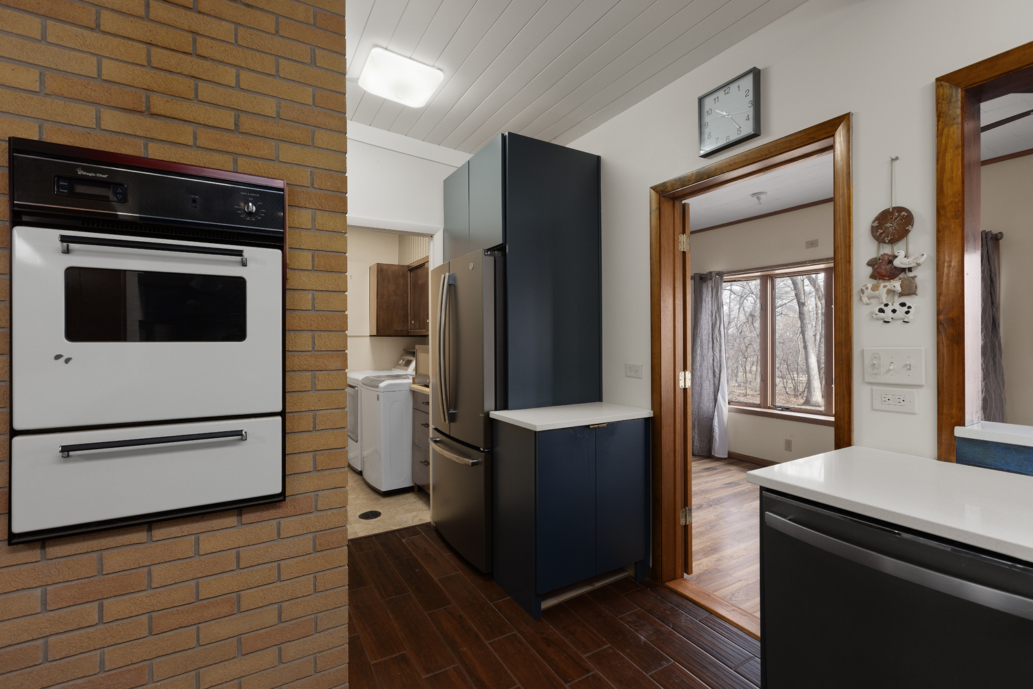 99 Gromer Road Elgin, IL 60120 - Photo 9 of 47 a kitchen with a refrigerator and a stove