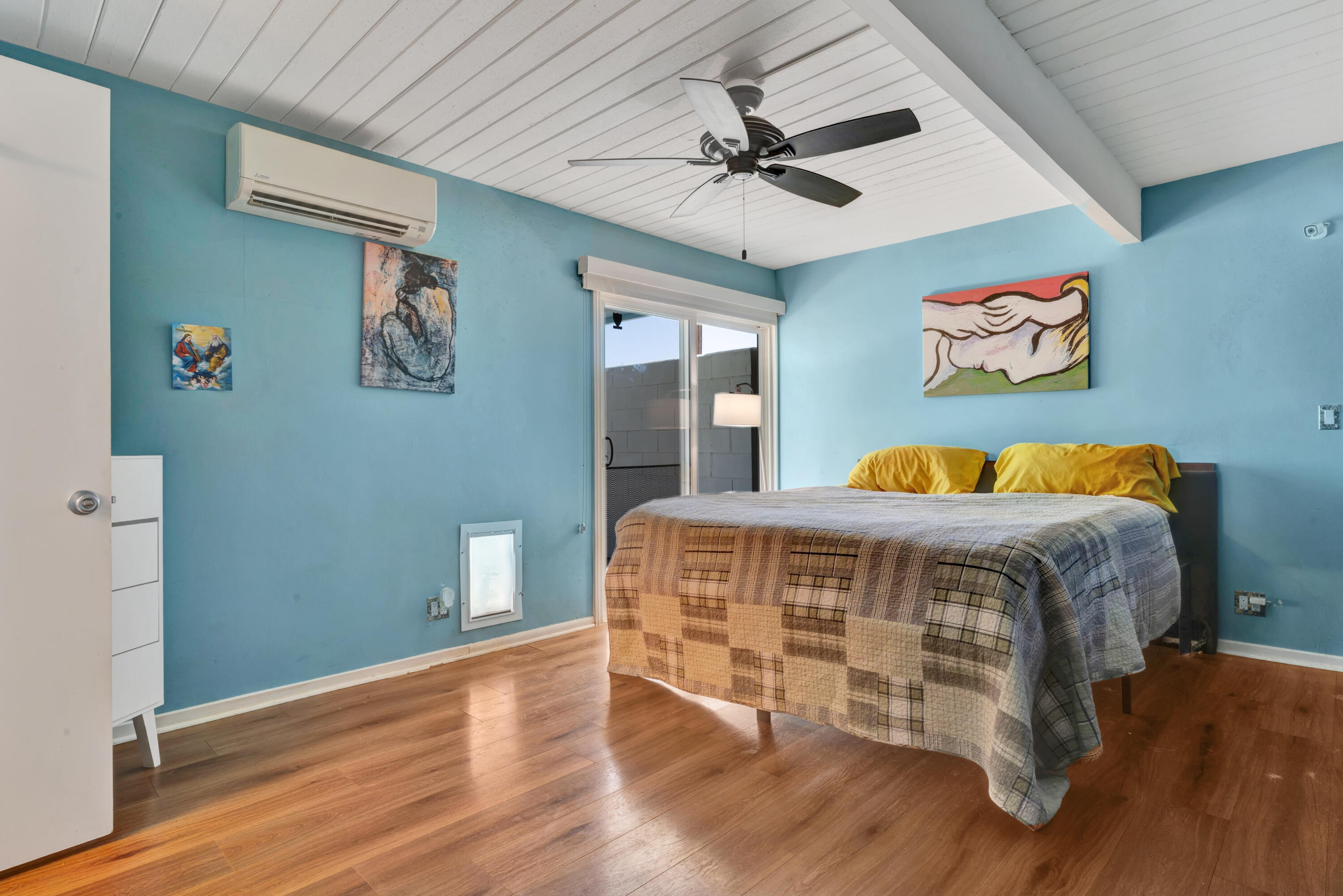 600 East Alexander Way Palm Springs, CA 92262 - Photo 23 of 43 a bedroom with a bed and wooden floor