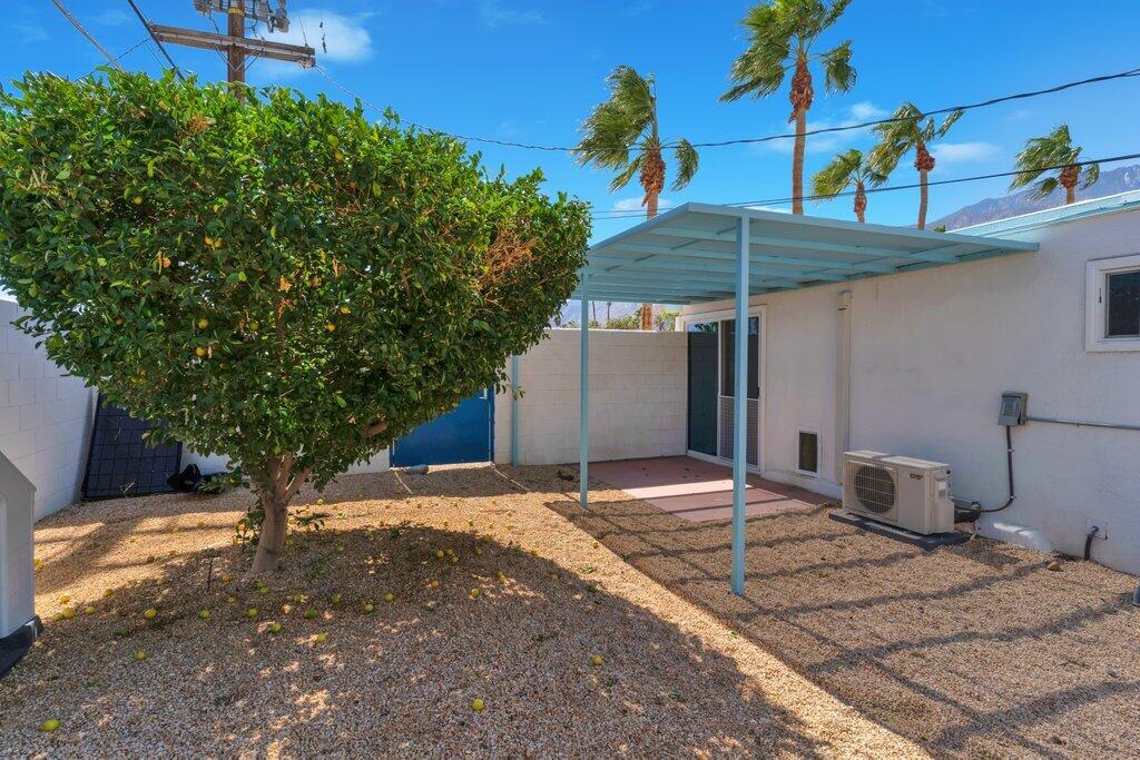 600 East Alexander Way Palm Springs, CA 92262 - Photo 25 of 43 a backyard of a house with shaded area