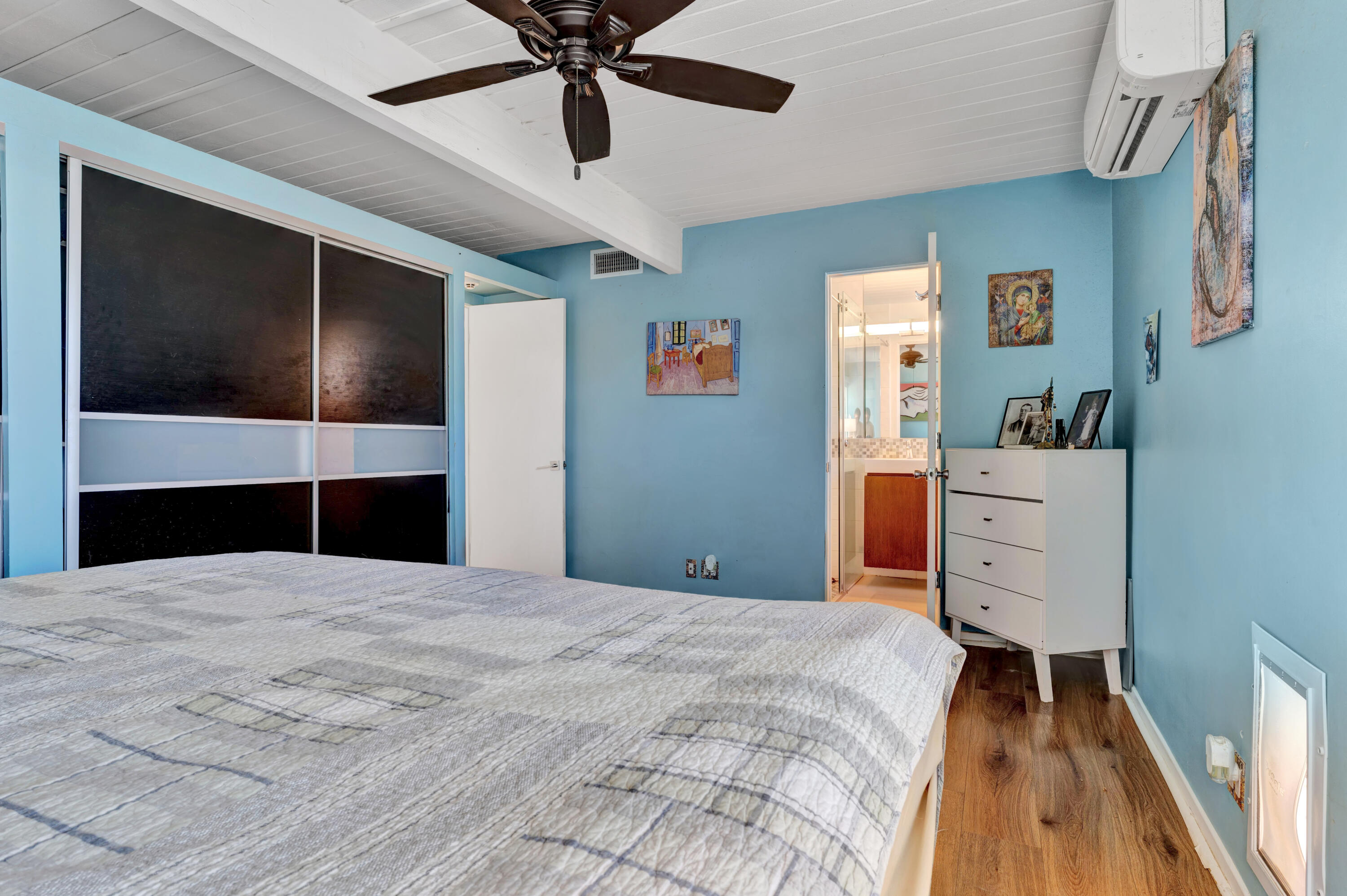 600 East Alexander Way Palm Springs, CA 92262 - Photo 27 of 43 a bedroom with a bed and a flat tv screen on dresser