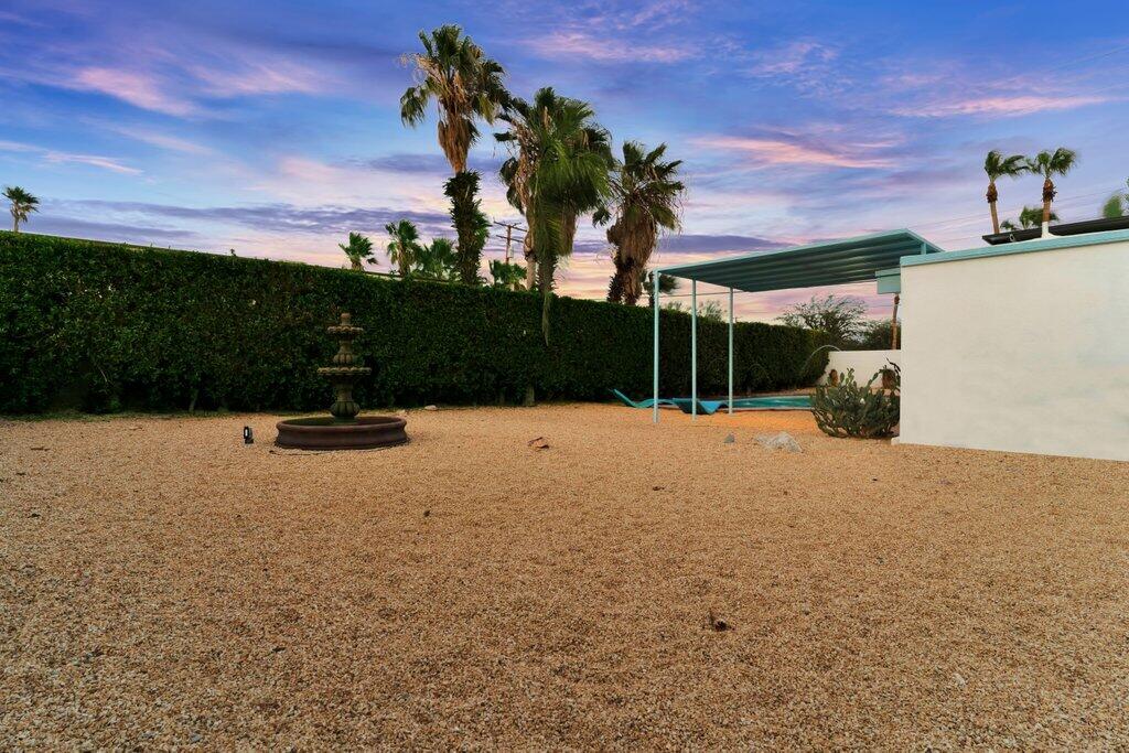 600 East Alexander Way Palm Springs, CA 92262 - Photo 38 of 43 a street view with a building in the background