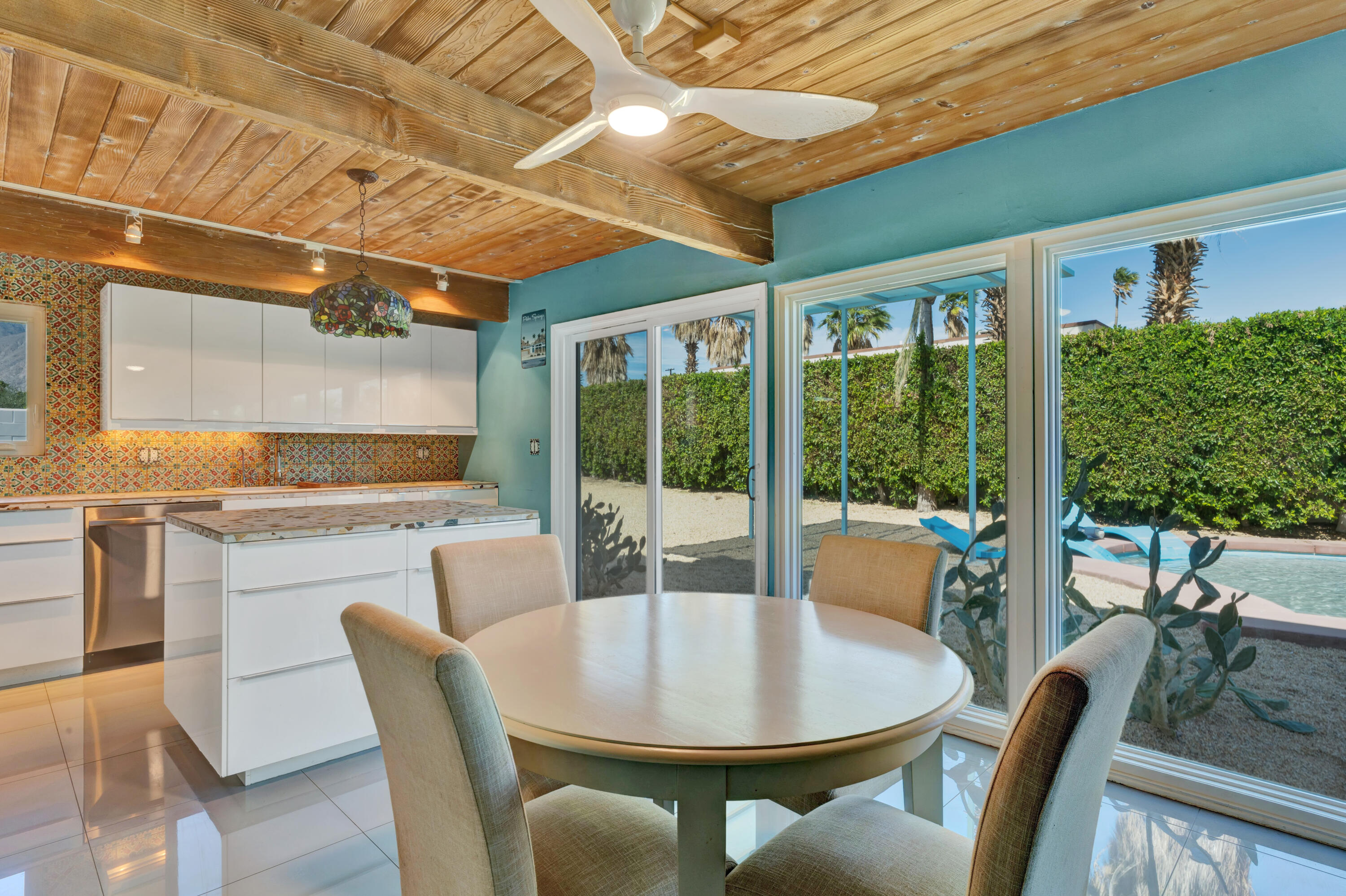 600 East Alexander Way Palm Springs, CA 92262 - Photo 7 of 43 a dining room with furniture window and outside view