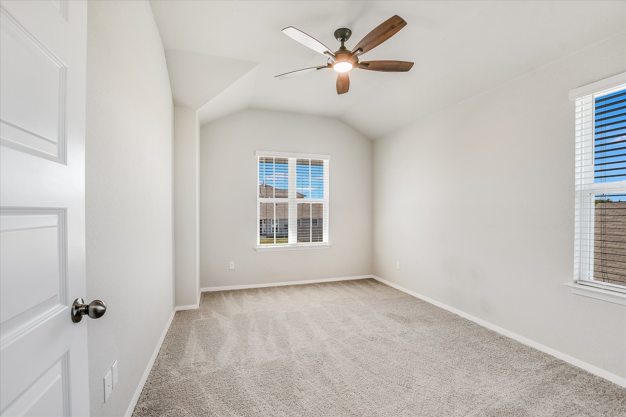 204 Crescent Street Georgetown, TX 78626 - Photo 10 of 12 an empty room with windows and fan