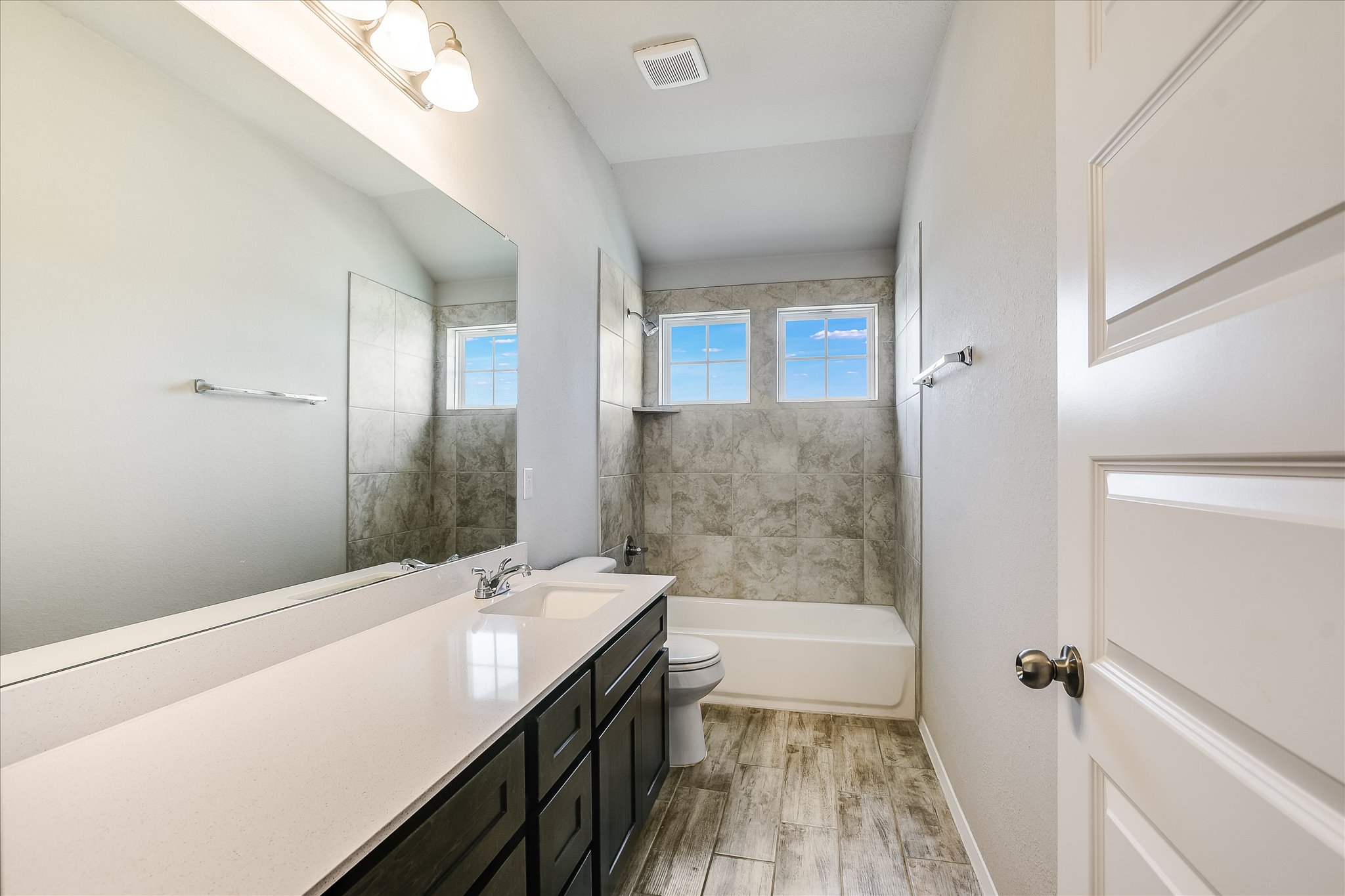 204 Crescent Street Georgetown, TX 78626 - Photo 9 of 12 a bathroom with a bathtub and a sink