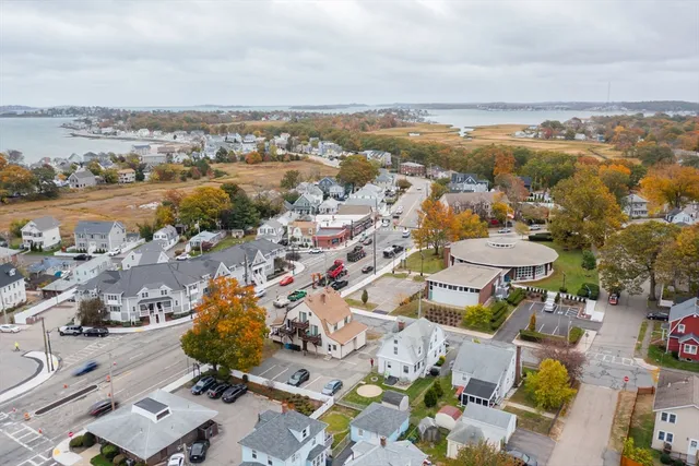 a view of balcony with wooden floor and outdoor seating