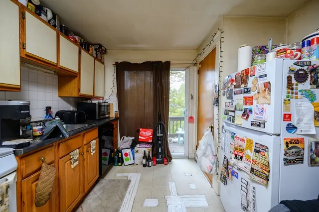 a view of a workspace with furniture and a workspace