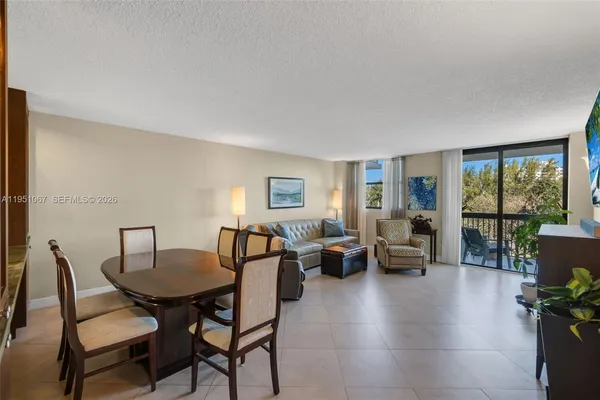 a view of a livingroom with furniture window and outside view