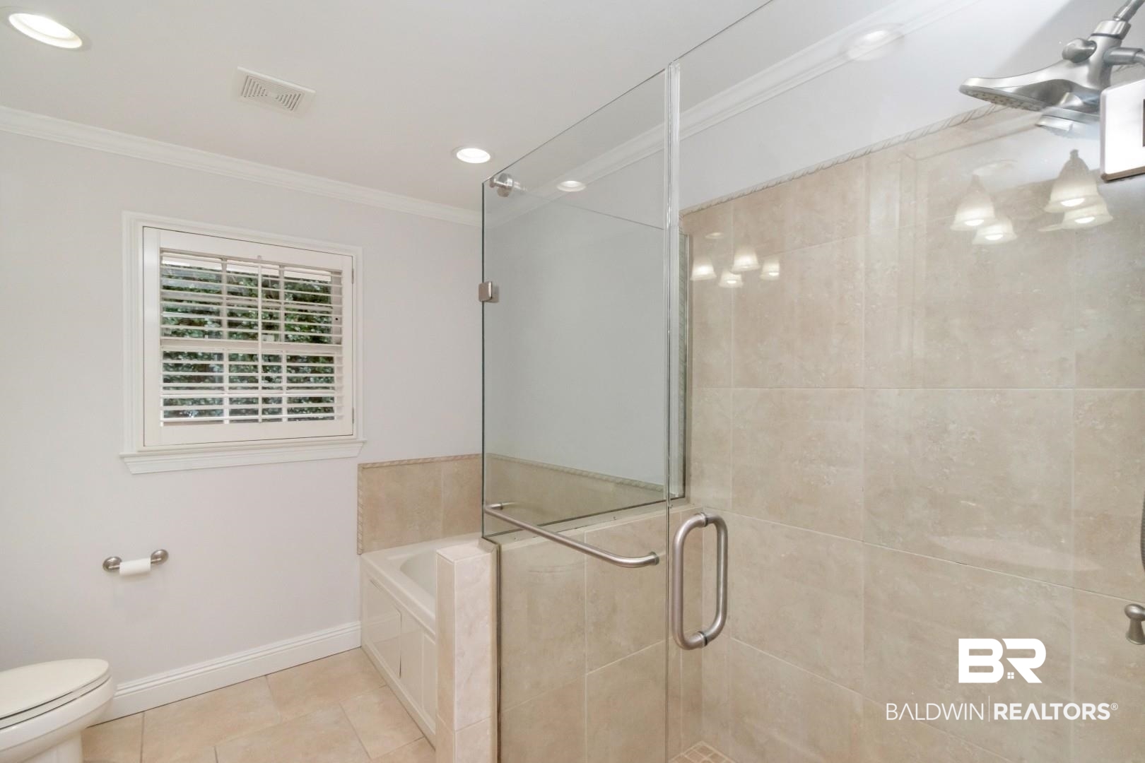 231 Rochester Road Mobile, AL 36608 - Photo 25 of 51 Bathroom featuring a garden tub, a shower stall, crown molding, light tile patterned floors, and recessed lighting