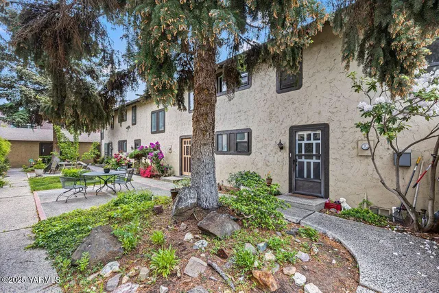 an aerial view of a city with lots of residential buildings