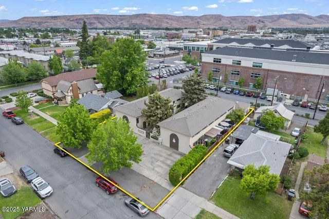 an aerial view of a city with lots of residential buildings