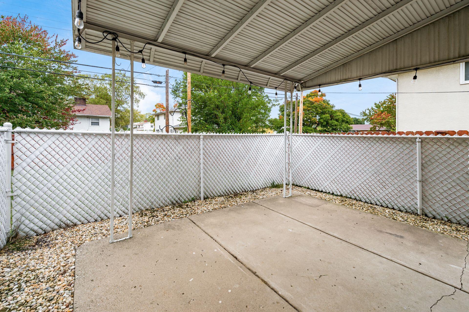5355 Karl Road Columbus, OH 43229 - Photo 38 of 39 PRIVATE COVERED REAR CONCRETE PATIO
