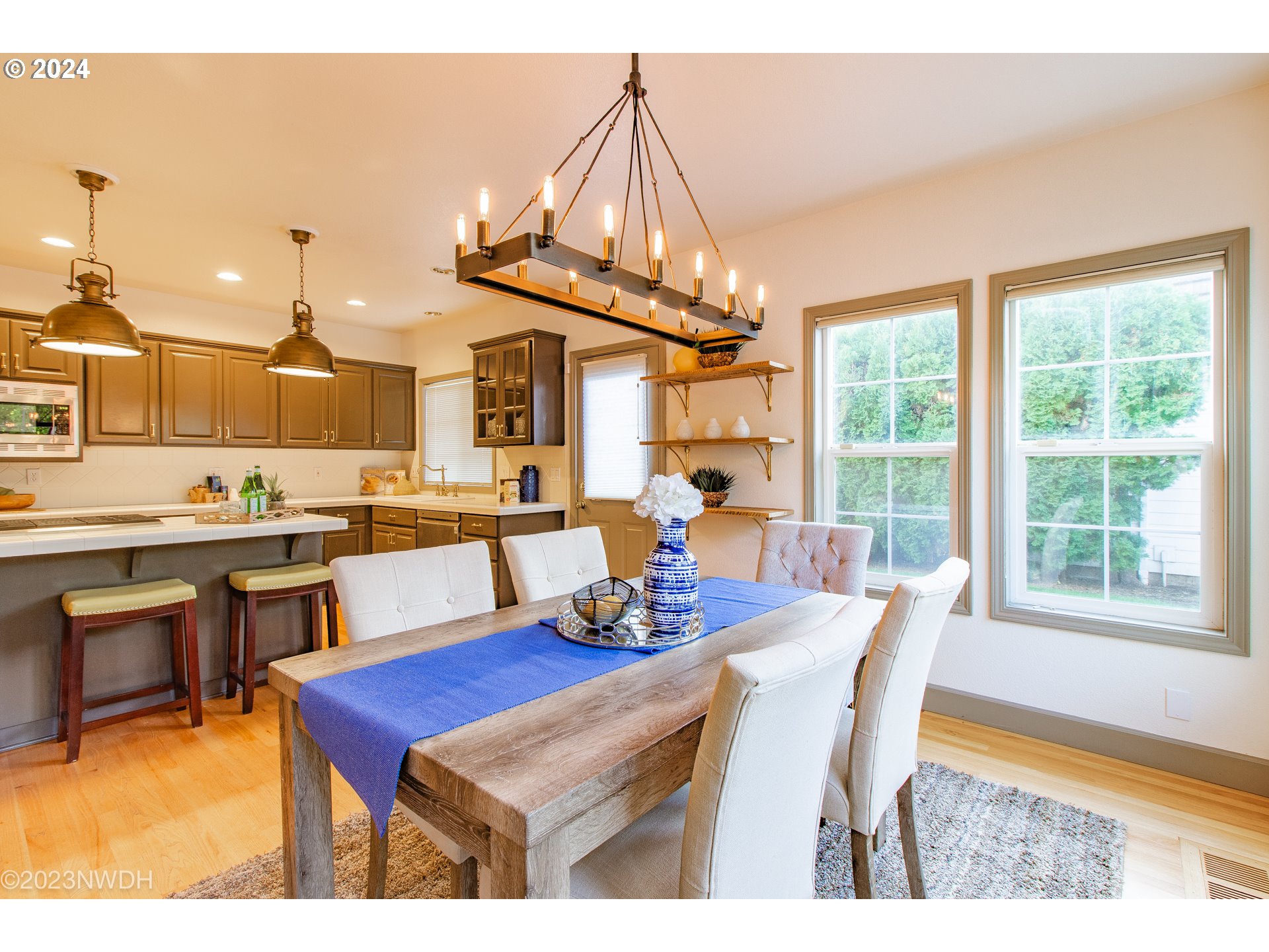 3435 Hampton Way Eugene, OR 97401 - Photo 20 of 46 a view of a dining room with furniture window and outside view