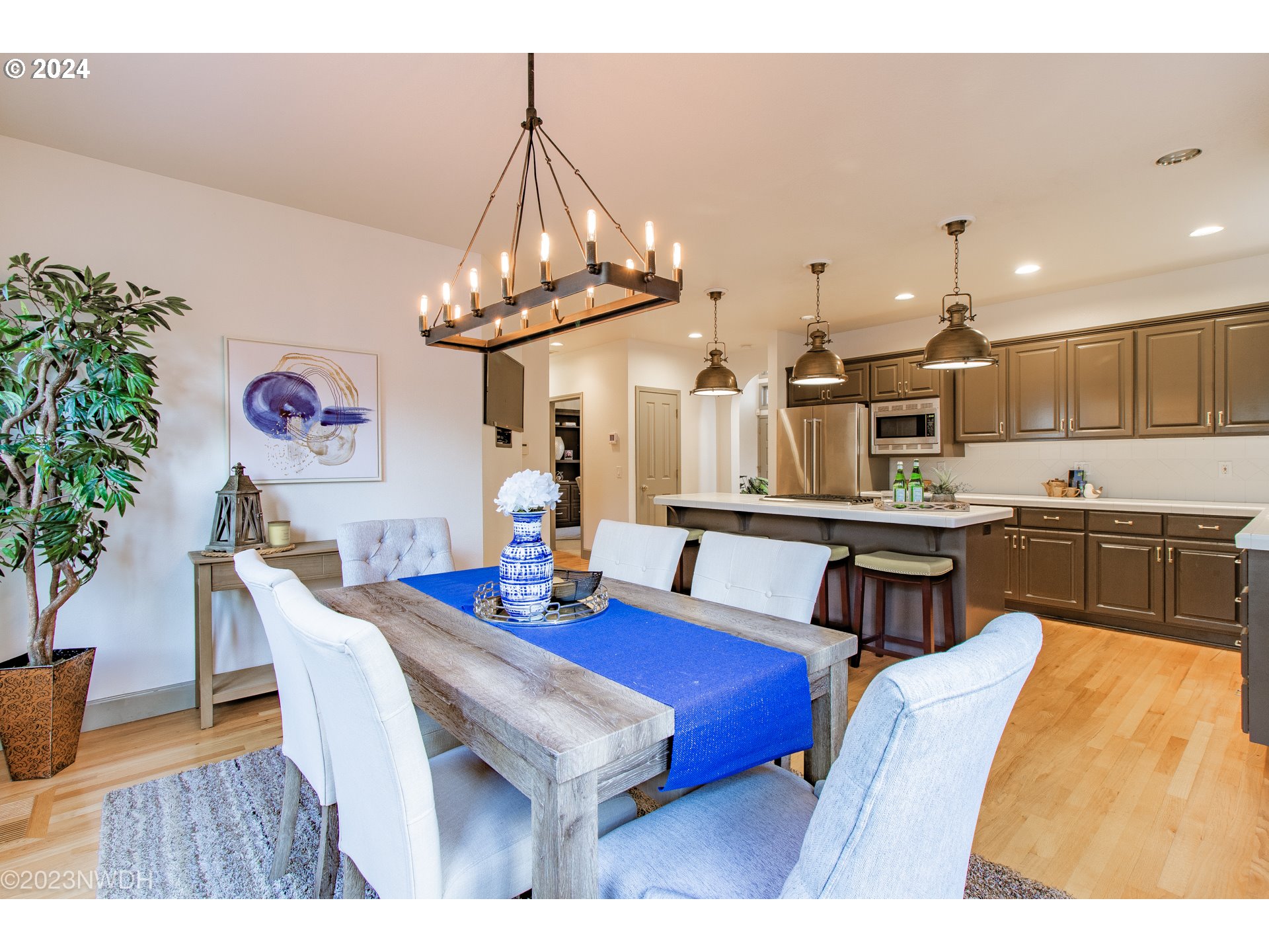 3435 Hampton Way Eugene, OR 97401 - Photo 21 of 46 a view of a dining room with furniture and wooden floor