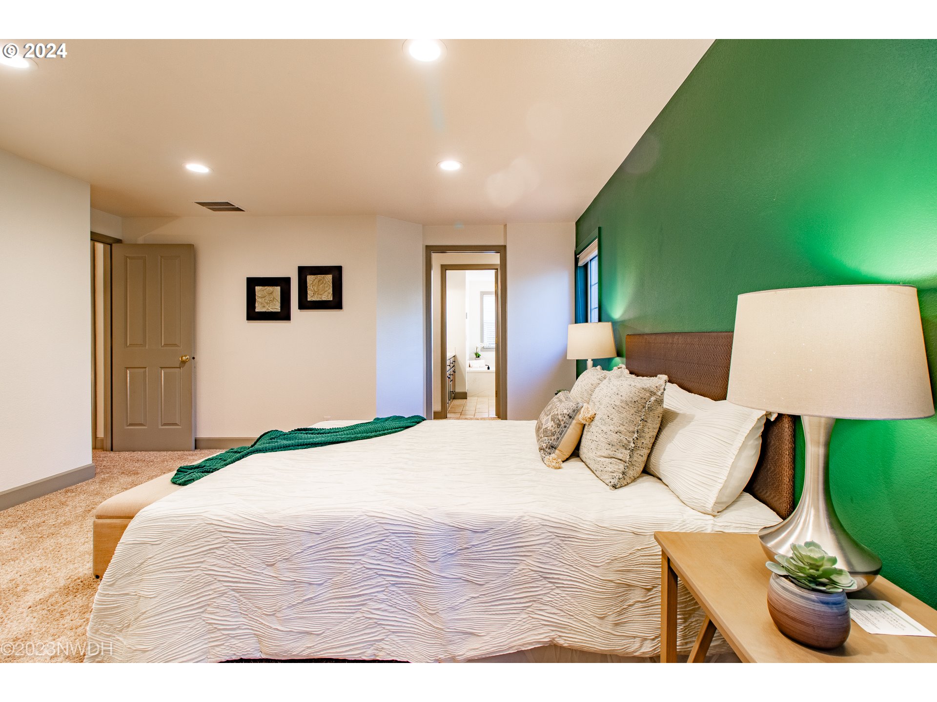 3435 Hampton Way Eugene, OR 97401 - Photo 28 of 46 a bedroom with a bed and a night stand