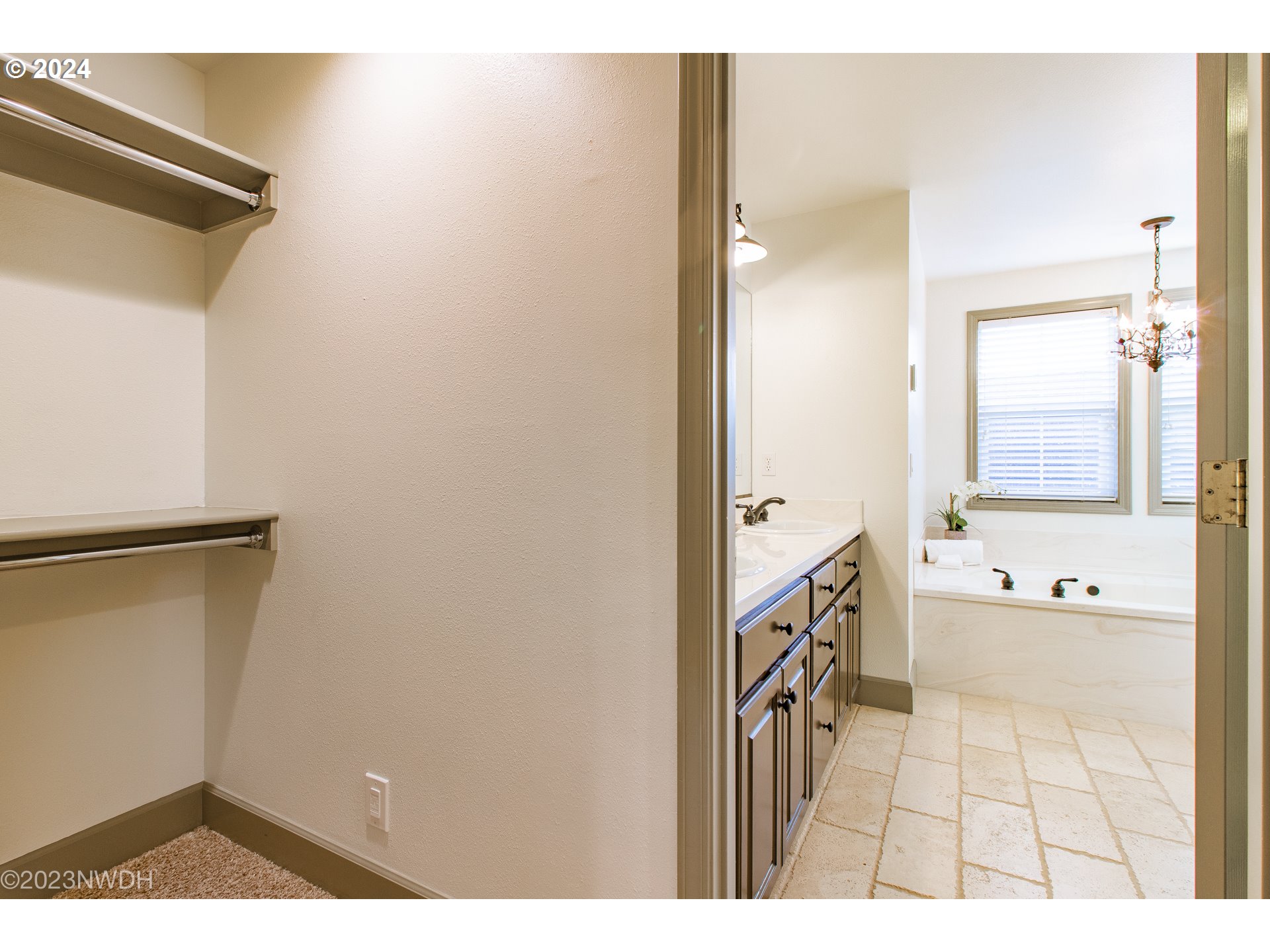 3435 Hampton Way Eugene, OR 97401 - Photo 33 of 46 a bathroom with a bathtub and a sink