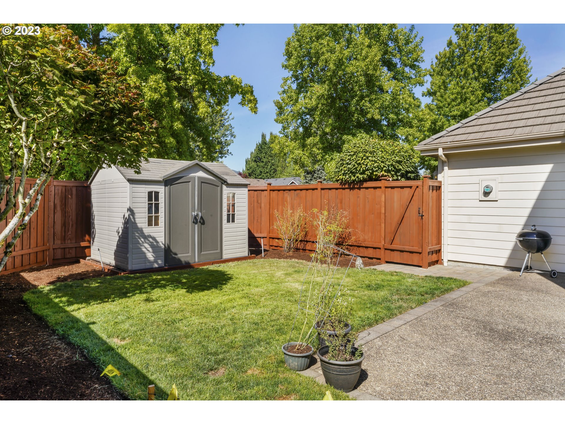 3435 Hampton Way Eugene, OR 97401 - Photo 40 of 46 a view of a house with backyard and a tree