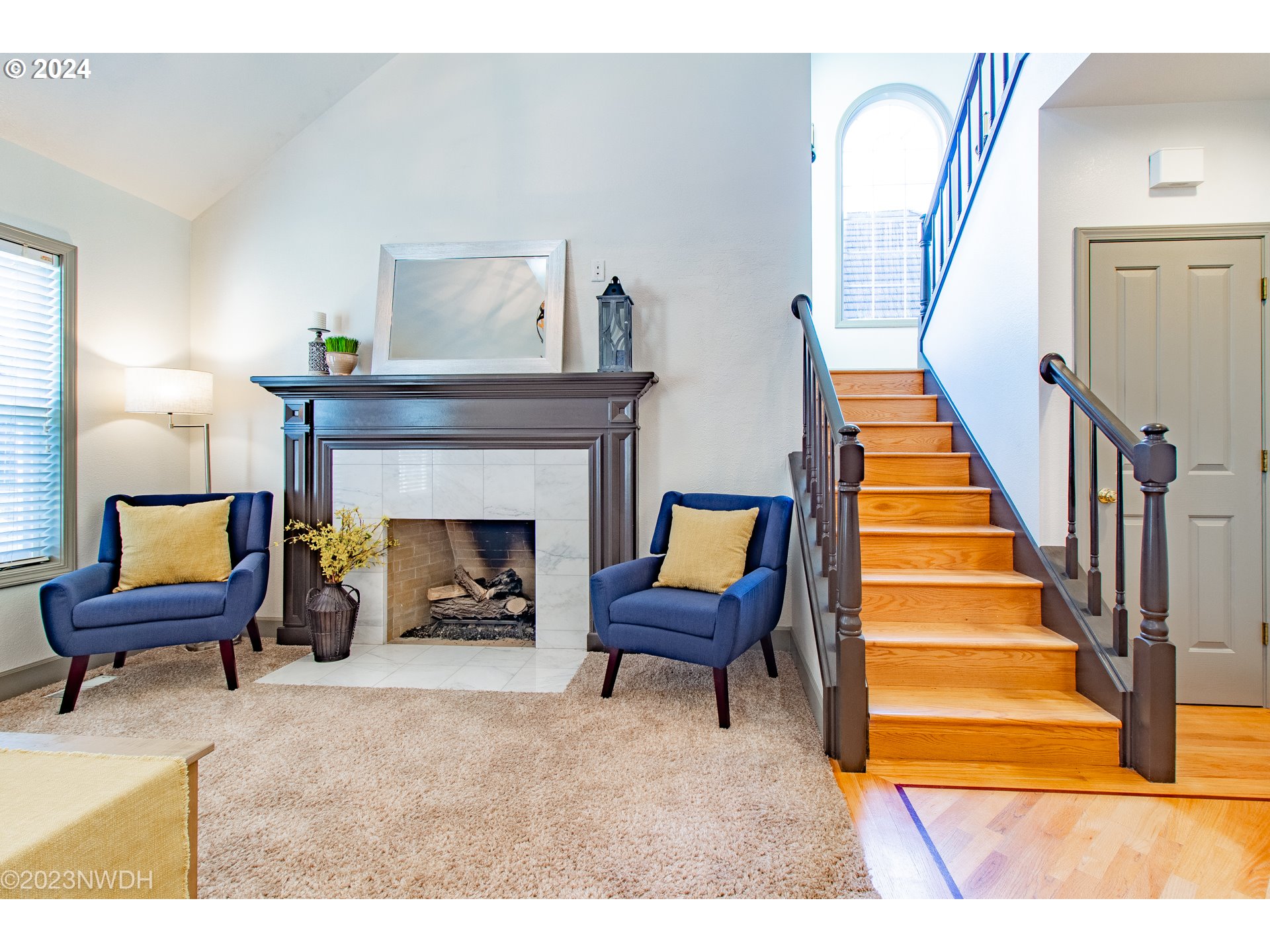 3435 Hampton Way Eugene, OR 97401 - Photo 7 of 46 a living room with furniture and a fireplace