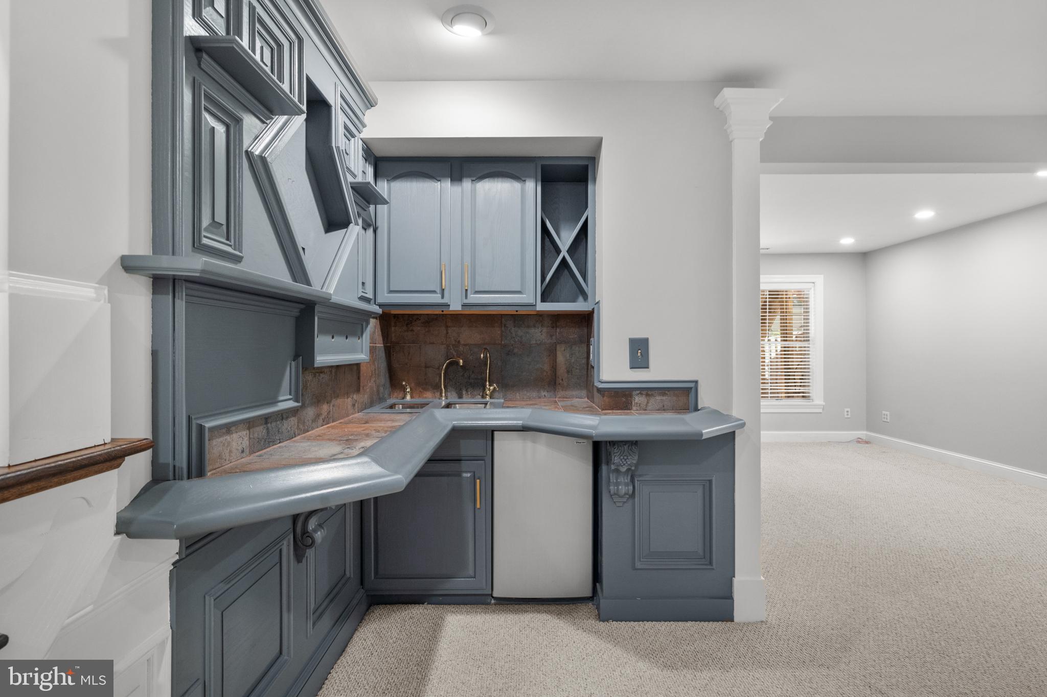 6491 Milva Lane Springfield, VA 22150 - Photo 42 of 59 Wet bar with tap