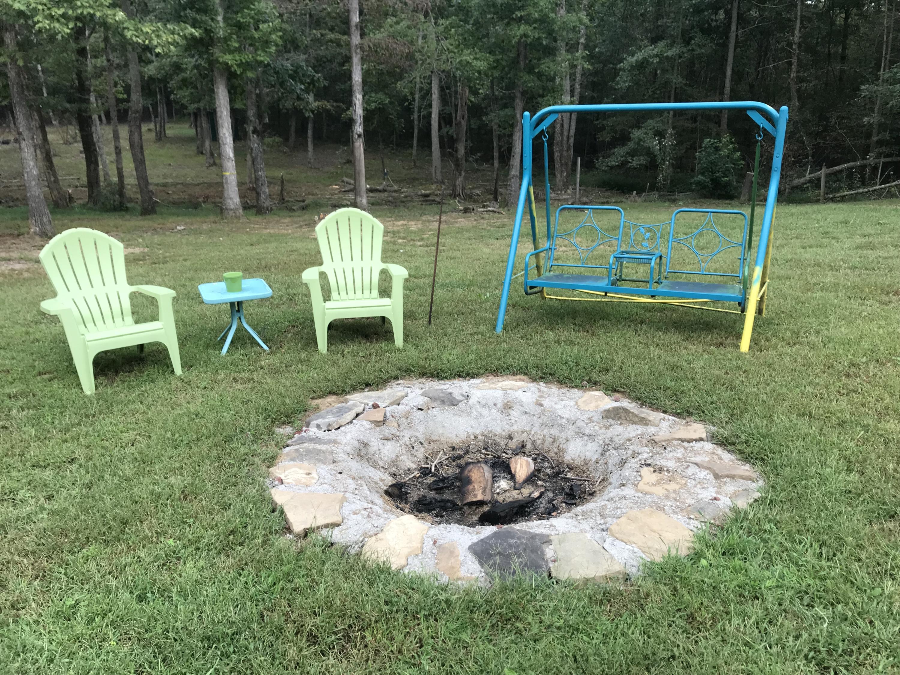 291 Ray Gadd Road Graysville, TN 37338 - Photo 26 of 33 Back yard fire pit