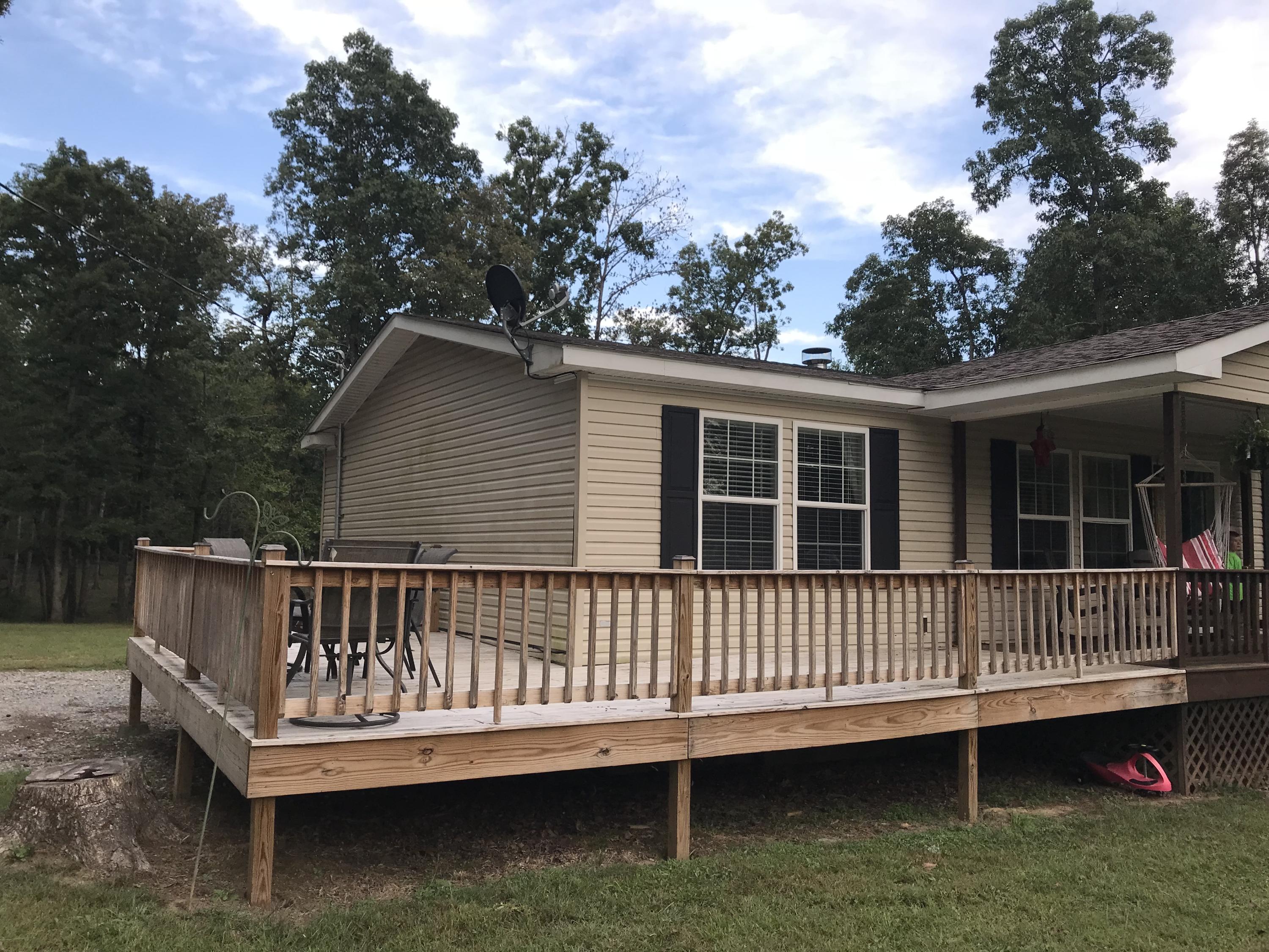 291 Ray Gadd Road Graysville, TN 37338 - Photo 33 of 33 Wrap around deck