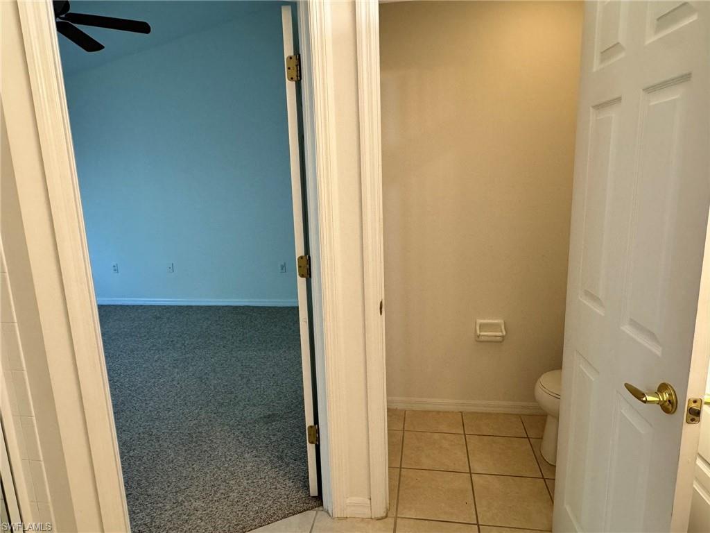 860 Hampton Circle, Unit 165 Naples, FL 34105 - Photo 13 of 38 a bathroom with a bathtub