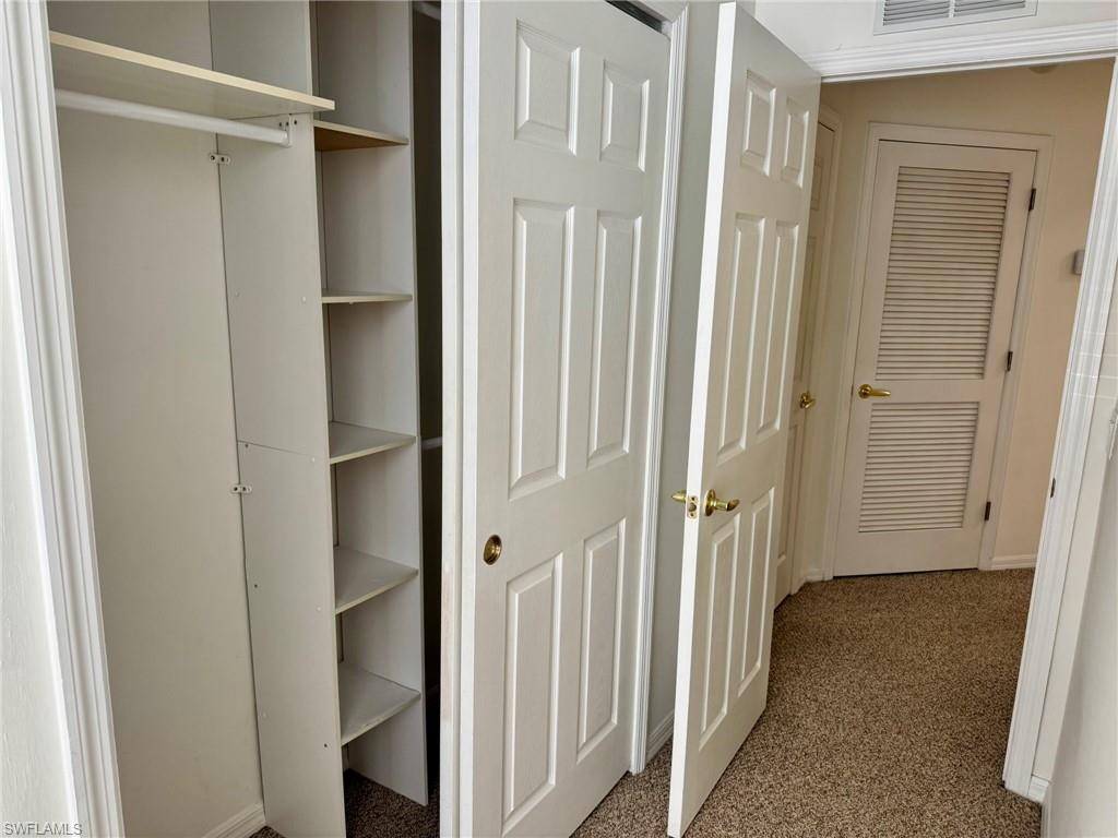 860 Hampton Circle, Unit 165 Naples, FL 34105 - Photo 25 of 38 a view of a bathroom