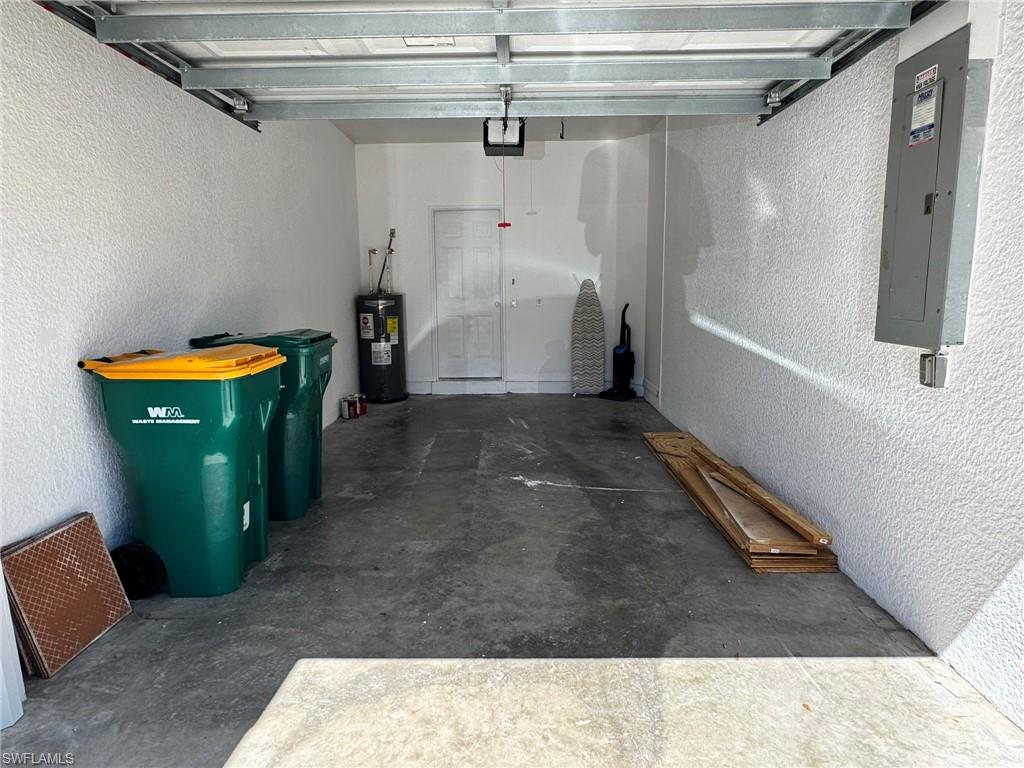 860 Hampton Circle, Unit 165 Naples, FL 34105 - Photo 31 of 38 a view of a garage