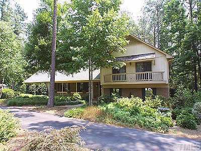 11812 Old Creedmoor Road Raleigh, NC 27613 - Photo 1 of 1 a front view of a house with a yard