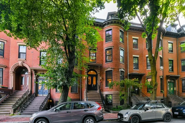 a front view of multiple houses
