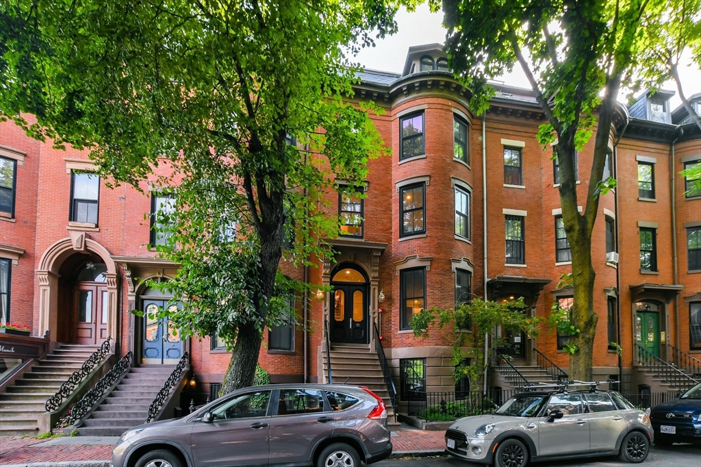 55 East Springfield Street, Unit 4 Boston, MA 02118 - Photo 16 of 16 a front view of multiple houses