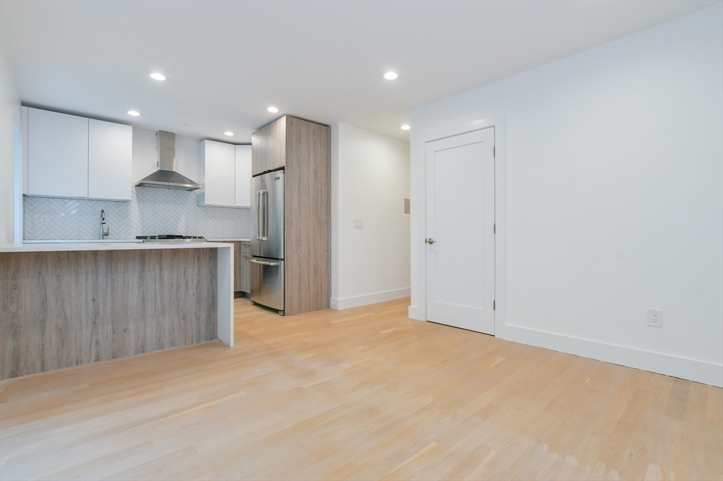 55 East Springfield Street, Unit 4 Boston, MA 02118 - Photo 9 of 16 a view of kitchen with refrigerator and window