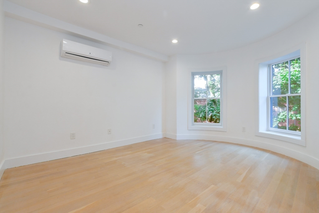 55 East Springfield Street, Unit 4 Boston, MA 02118 - Photo 10 of 16 an empty room with windows