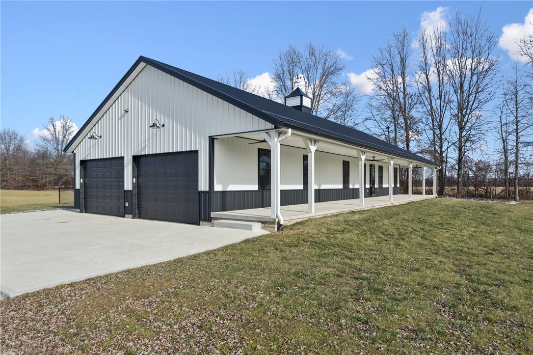 1602 Westboro Road Blanchester, OH 45107 - Photo 51 of 81 This newly constructed barndominium features a spacious front porch and ample garage space.