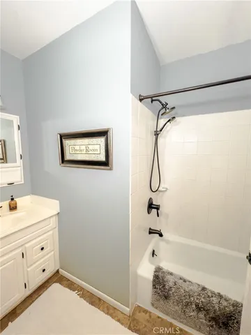 a view of a backyard with sitting area