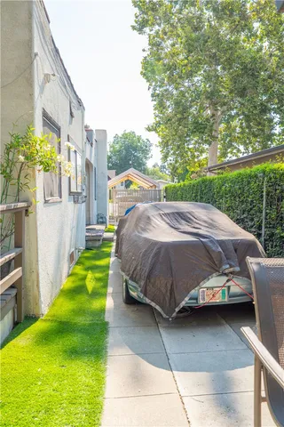 a view of a room with table and chairs