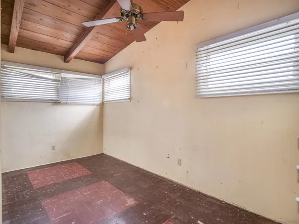 an empty room with windows