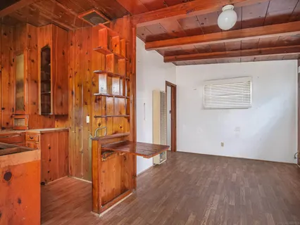 a view of entryway with wooden floor
