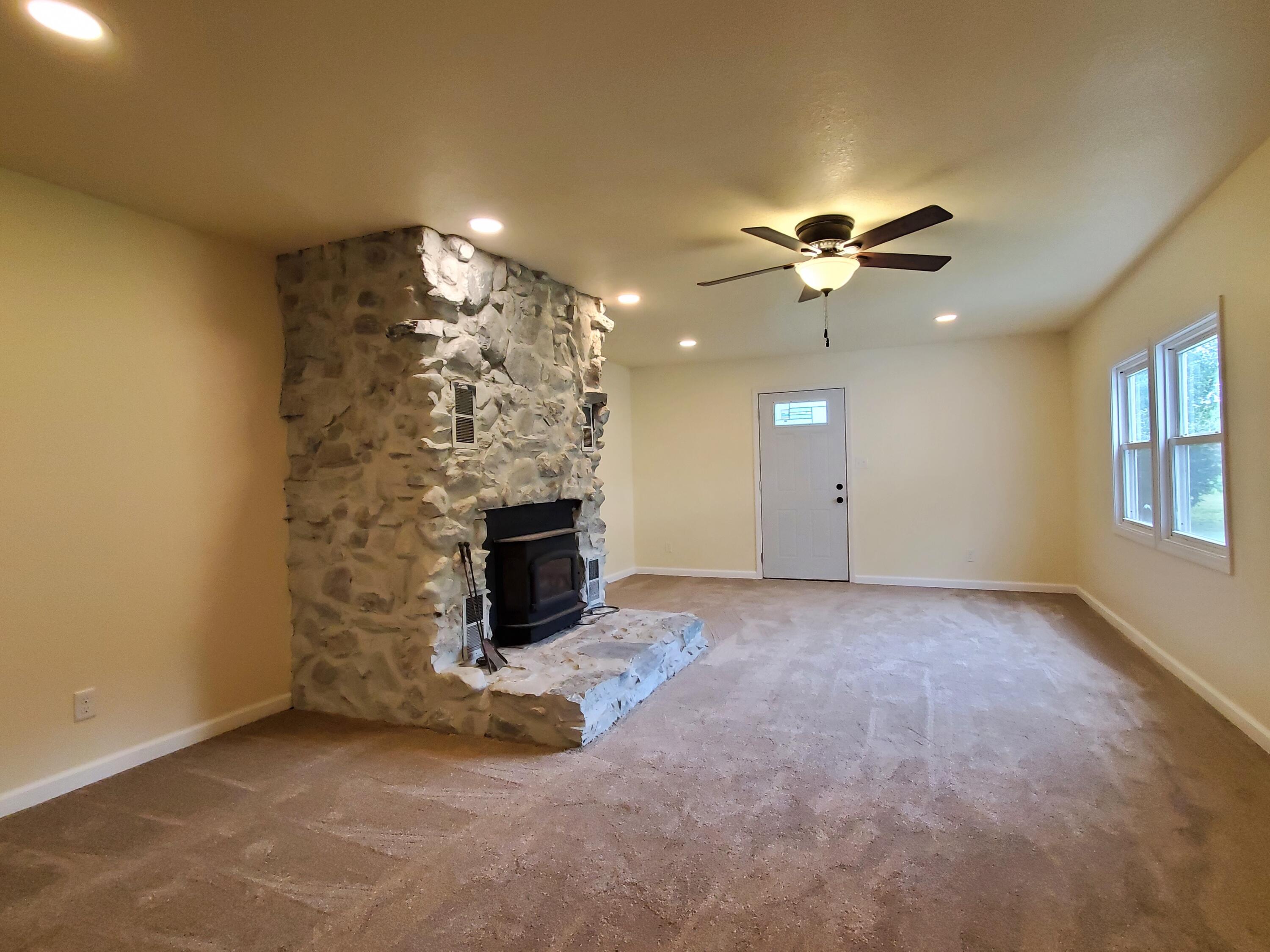 218 West Allen Street Kentland, IN 47951 - Photo 4 of 11 a view of a livingroom with a fireplace