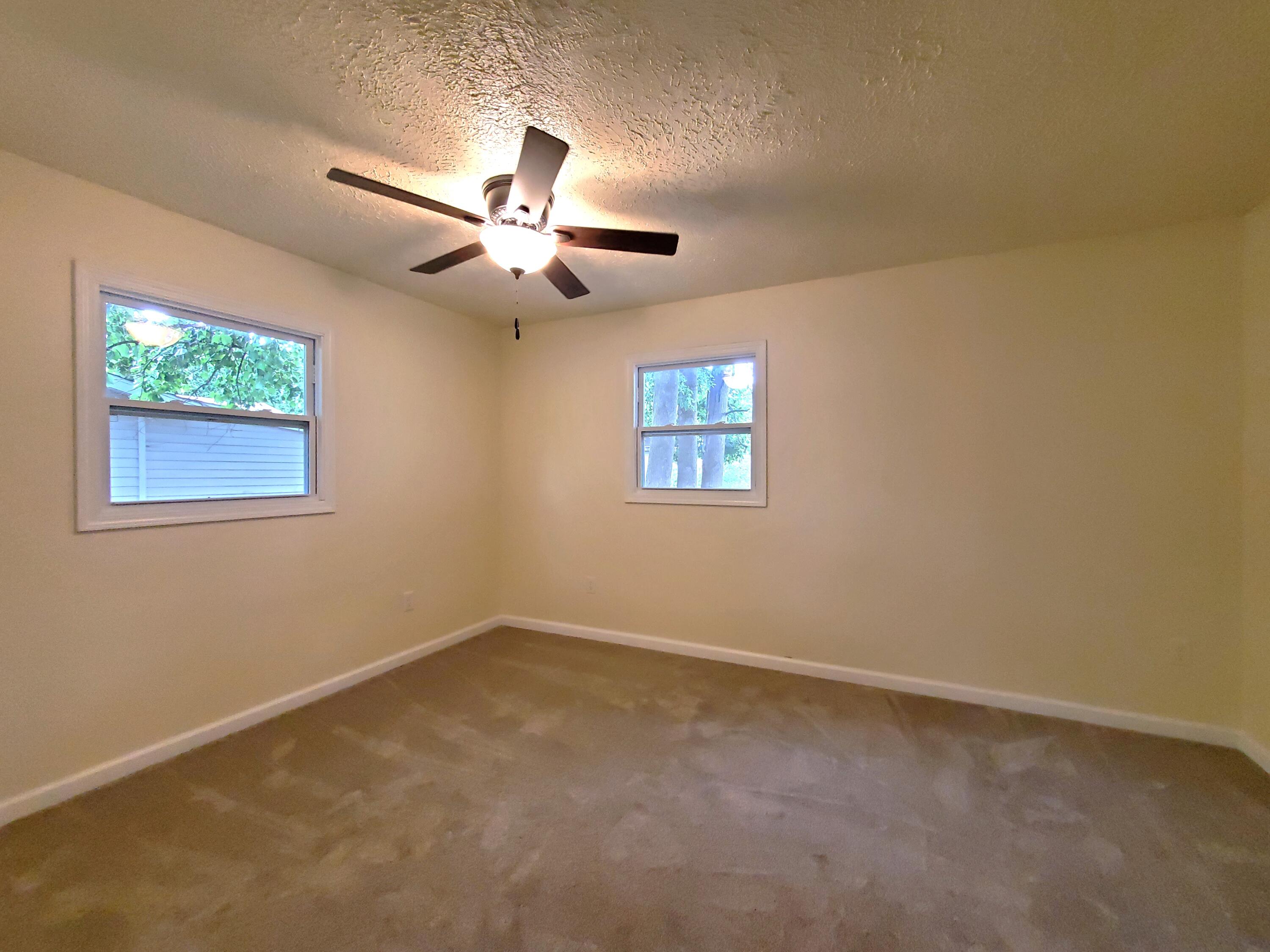 218 West Allen Street Kentland, IN 47951 - Photo 10 of 11 a view of an empty room with a window