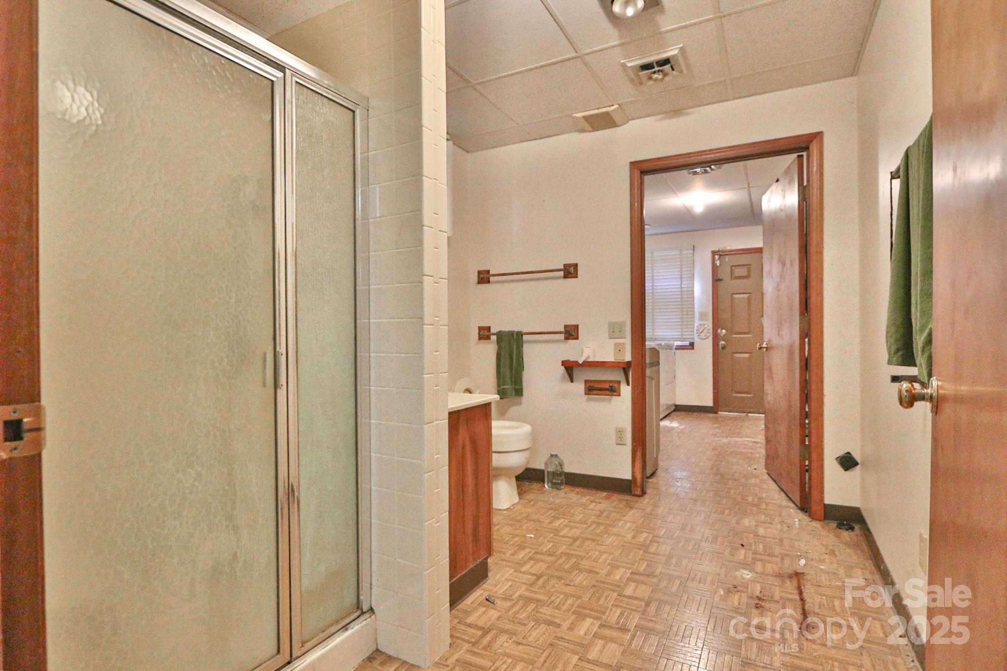 5313 Friendship Circle Road East Bend, NC 27018 - Photo 18 of 48 a view of a bathroom with a glass shower door