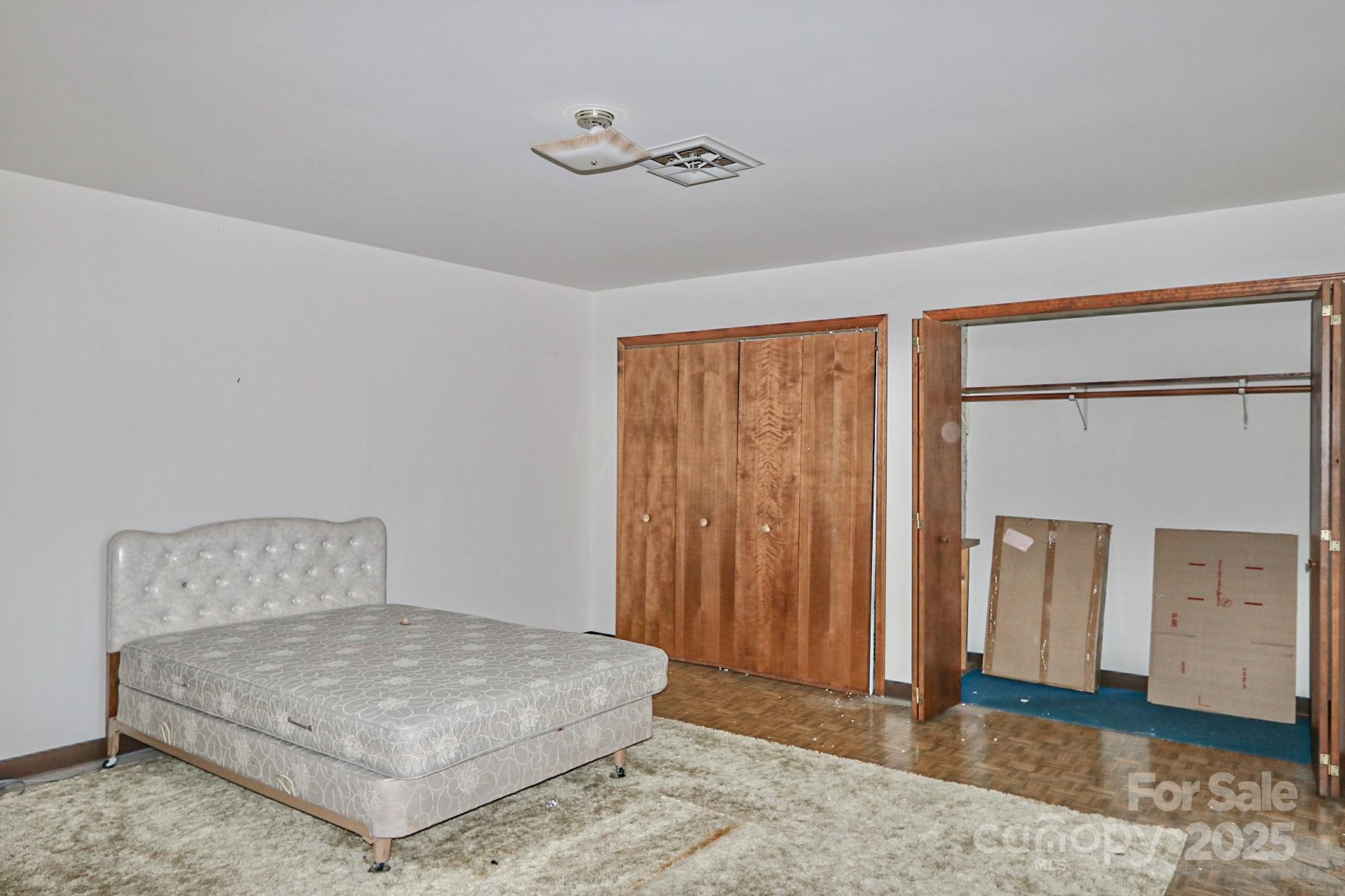 5313 Friendship Circle Road East Bend, NC 27018 - Photo 35 of 48 a bedroom with a bed and a window