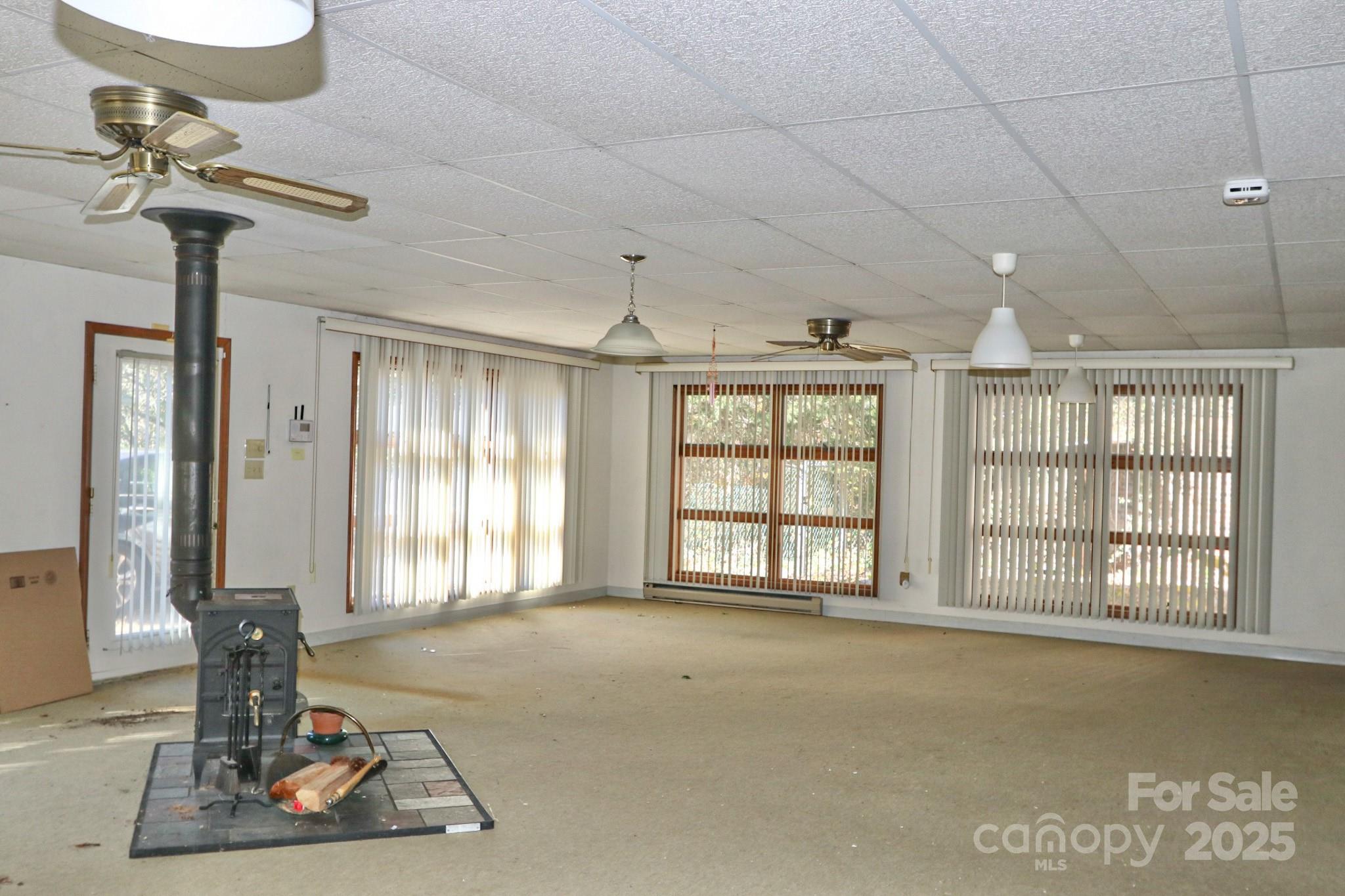 5313 Friendship Circle Road East Bend, NC 27018 - Photo 4 of 48 a view of an empty room with a window