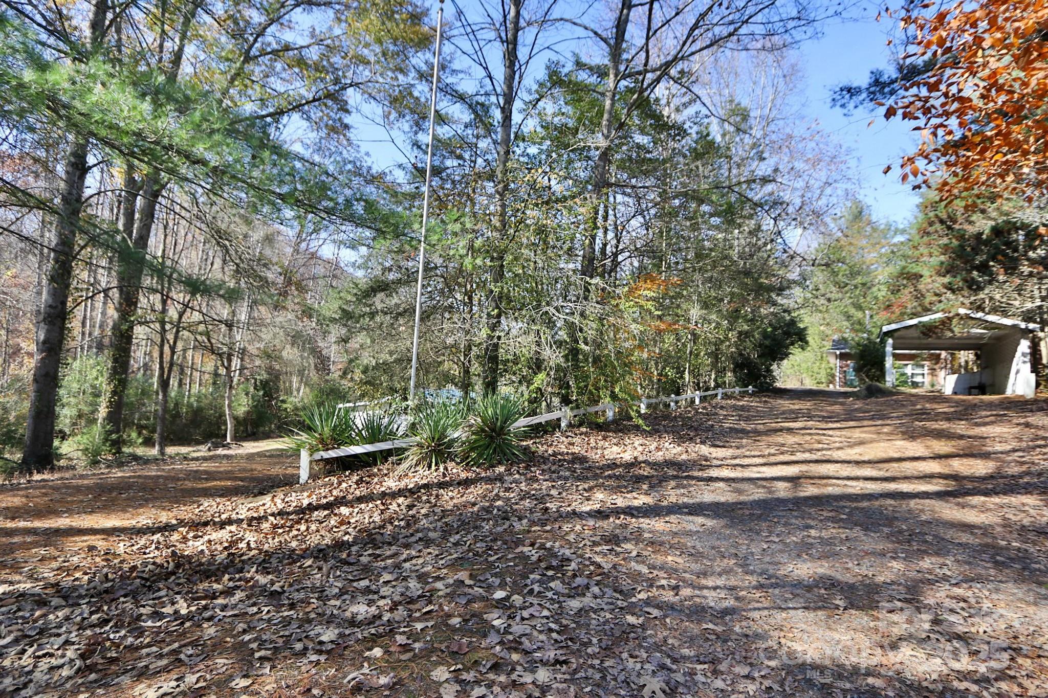 5313 Friendship Circle Road East Bend, NC 27018 - Photo 41 of 48 a view of street with houses and trees
