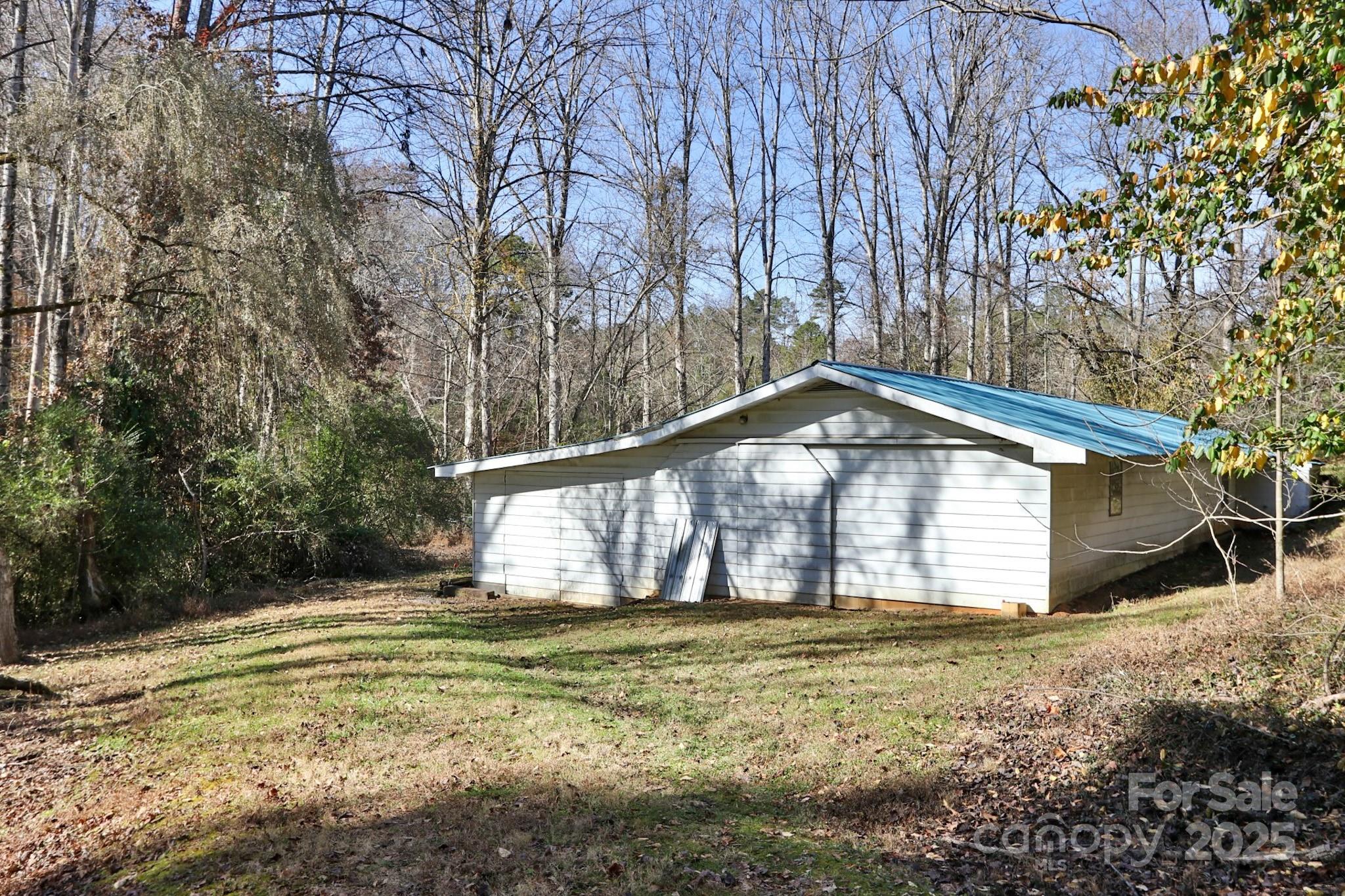 5313 Friendship Circle Road East Bend, NC 27018 - Photo 42 of 48 a view of a house with a yard