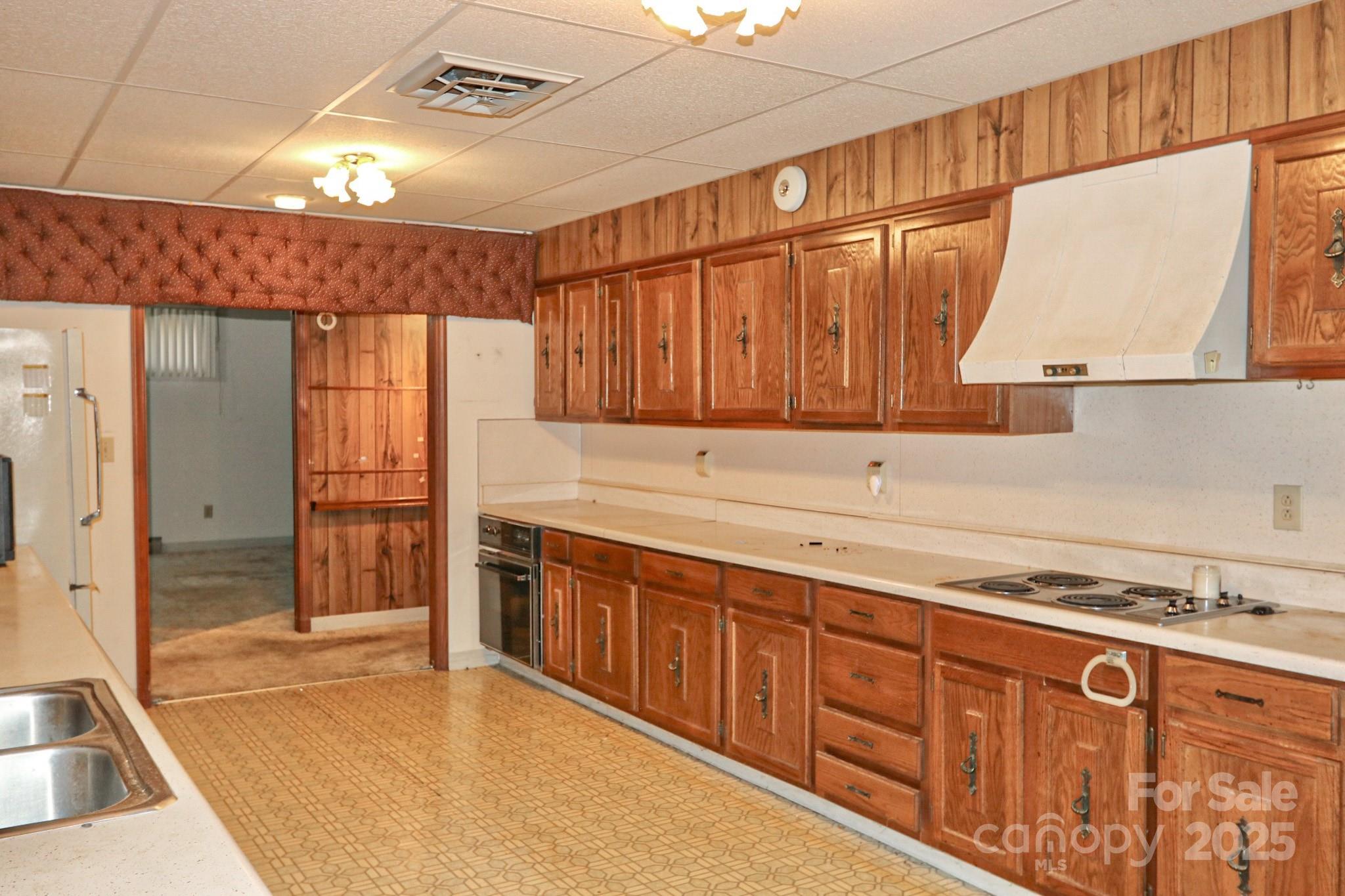 5313 Friendship Circle Road East Bend, NC 27018 - Photo 9 of 48 a kitchen with stainless steel appliances granite countertop a sink and a refrigerator